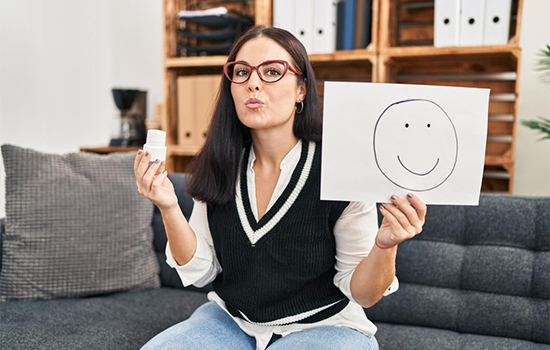 young-hispanic-woman-working-depression-holding-happy-emotion-paper-pills-looking-camera-blowing-kiss-being-lovely-sexy-love-expression_839833-35271